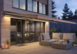 Garden furniture covered by a Warema awning in Suffolk